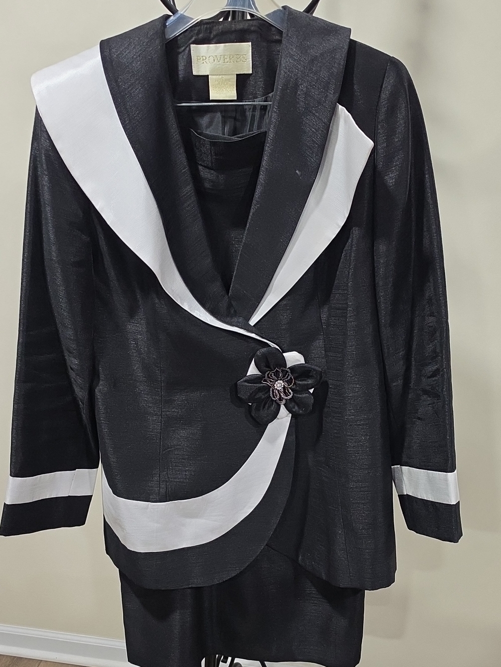 Black & White Women's Jacket with Decorative Flower Accent With Lined Skirt.